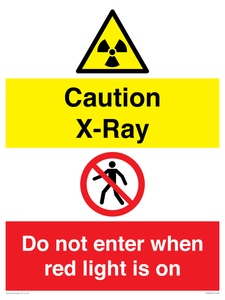 Caution X-Ray. Do not enter when red light is on